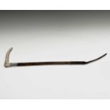 A Swaine hunting whip, with antler grip, hallmarked collar engraved with initials 'P.M.R', and