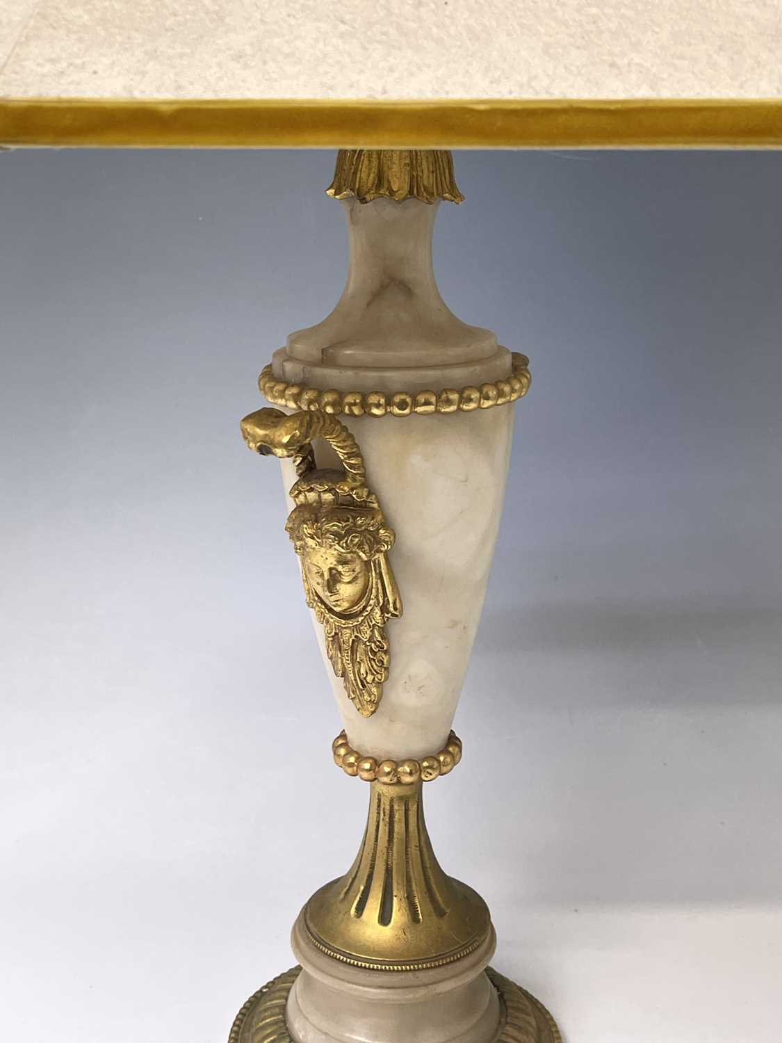 An ornate alabaster table lamp, early 20th century, with gilt metal mask handles and mounts, - Image 3 of 4