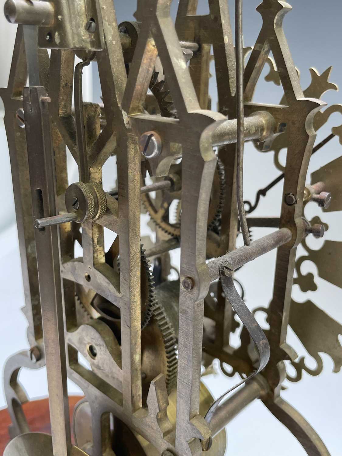 A brass cathedral skeleton clock, 20th century, with single fusee movement, striking on a bell, - Image 5 of 8