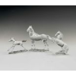 Swarovski Crystal - a standing horse, height 13.5cm, a rearing horse, height 11cm, and a Swarovski