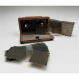 A mahogany folding stereoscope viewer, labelled for Verascope Richard, width 12.5cm, together with a