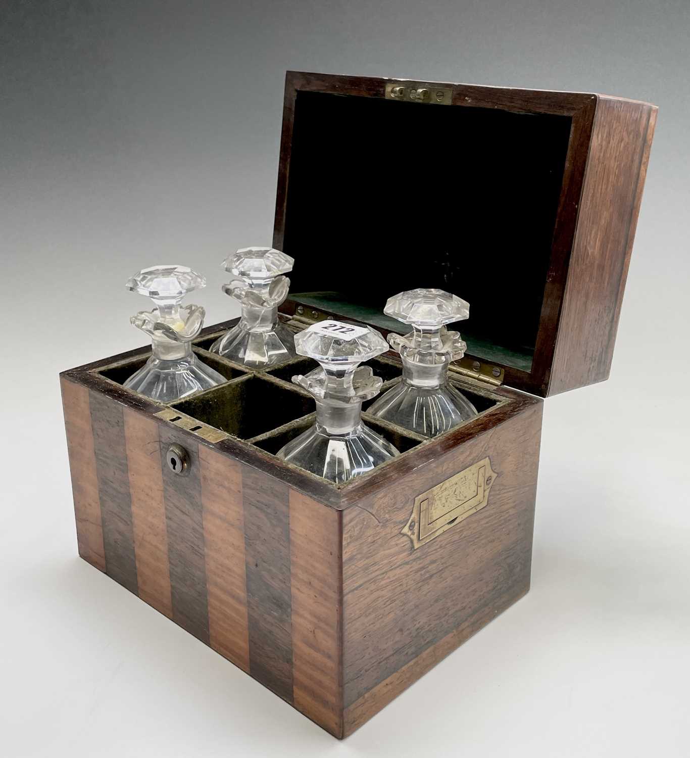 A satinwood and rosewood banded decanter box, early 19th century, containing four (of six) decanters