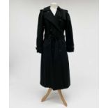 A ladies Burberry Prorsum black belted trench raincoat with Burberry check lining, label size long