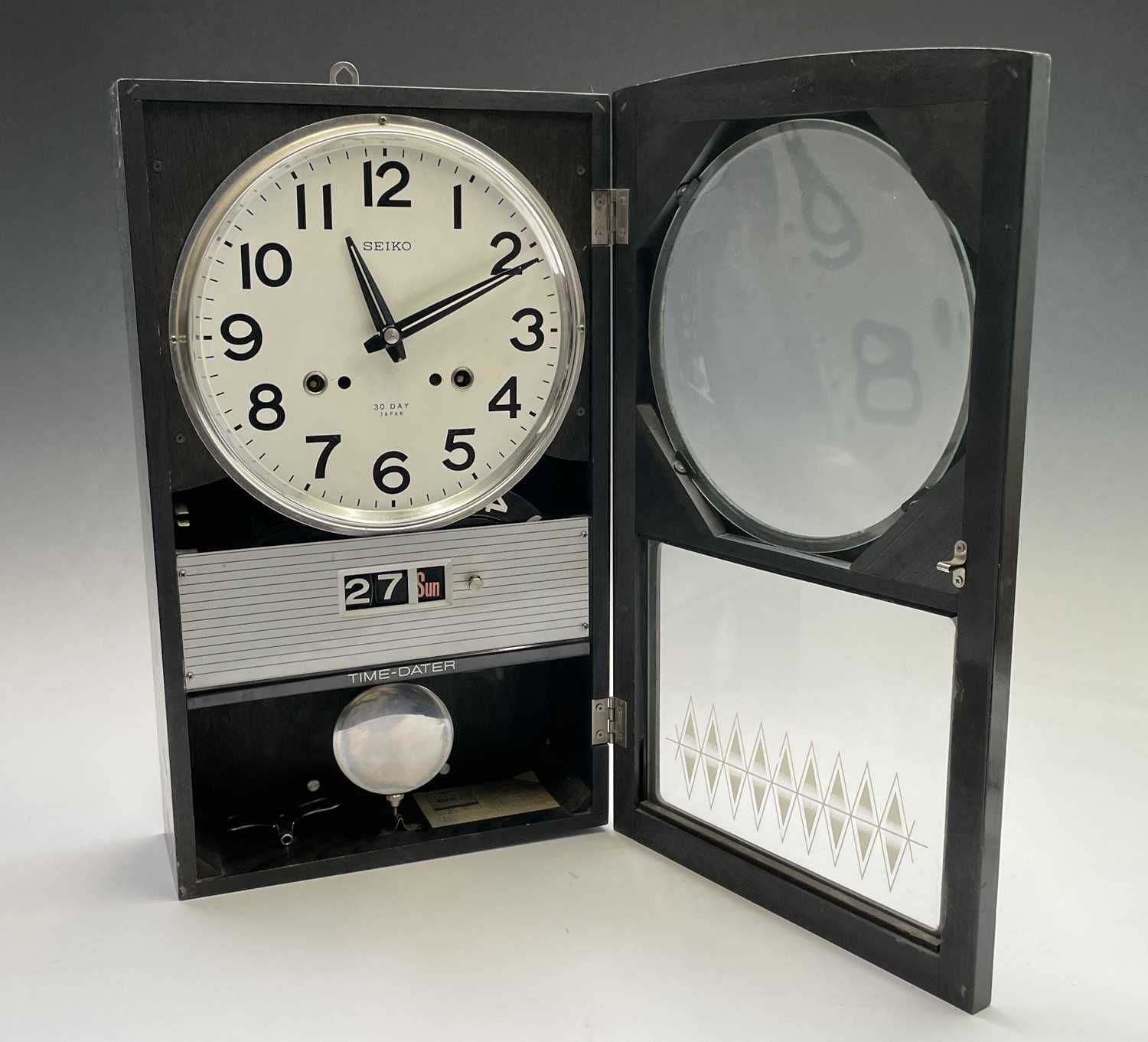 A Seiko Time-Dater thirty-day wall clock, 1960s, with digital day/date and woodgrain finish height - Image 7 of 7