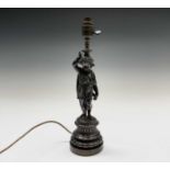 A Victorian cast bronze figural table lamp. Height 41cm.