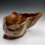 A gnarled walnut large bowl, of rustic form, with misshapen rim, height 30cm, total width 58cm.