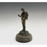 An 18th/19th century gilt bronze figure of Jason, on carved stone base. Height 16cm.Condition