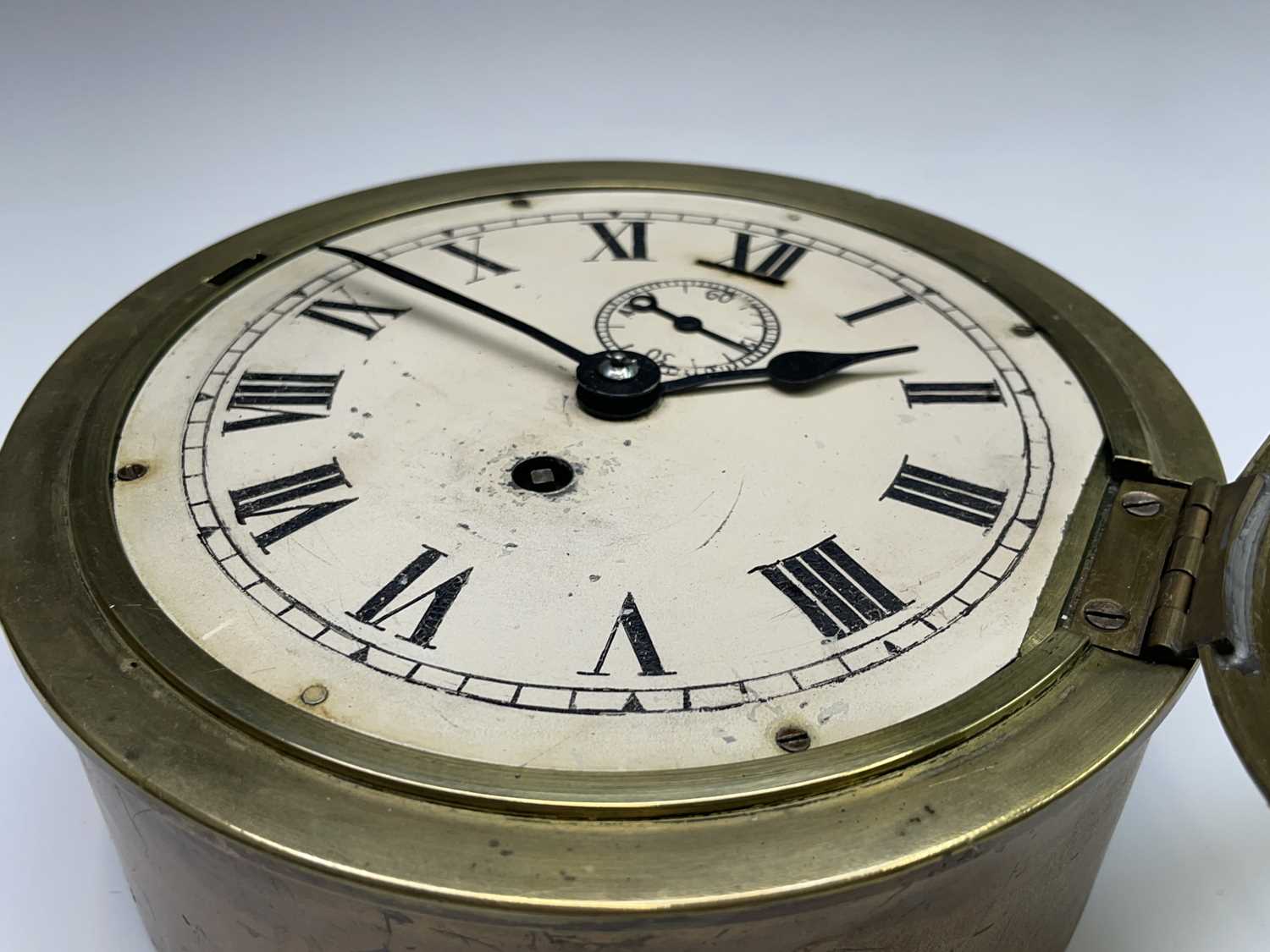 A brass cased ship's bulkhead wall clock, early 20th century, the painted dial with subsidiary - Image 5 of 5