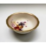 A Royal Worcester bowl, painted with autumnal foliage and berries etc, signed K Blake (Kitty Blake),