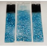Three studio glass panels, with blue coloured bubble textured decoration, height 46.5cm (3).