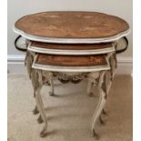 A nest of three French walnut, kingwood and marquetry occasional tables, circa 1920, the largest