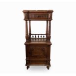 A French rosewood bedside table, late 19th century with marble top above a drawer and cupboard,