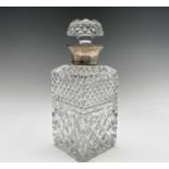 A silver mounted cut glass decanter and stopper, of square section, height 24cm.