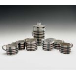 A Briglin studio pottery tea set, comprising of six cups, a milk jug, a sugar bowl and a teapot.