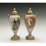 A pair of Fielding & Co Crown Devon vases and covers, one with coloured decoration of pheasants,