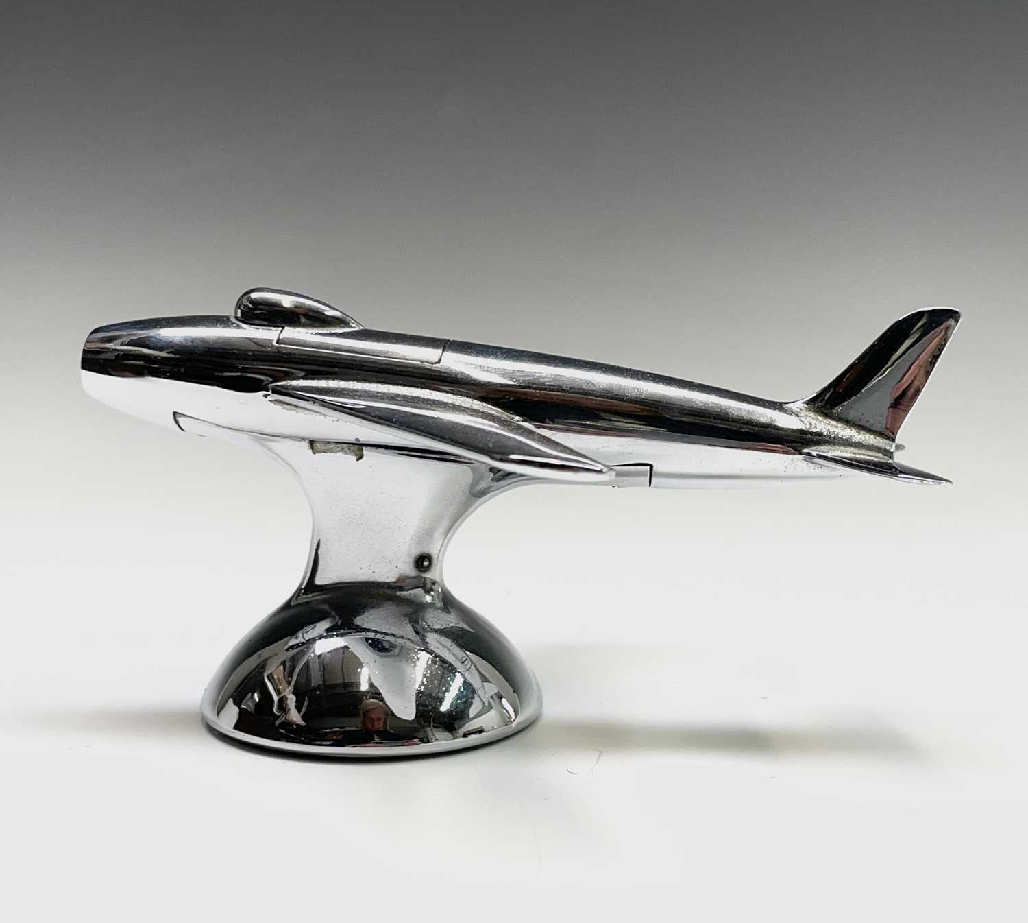 A Dunhill 'Sabre' jet fighter table lighter, 1950s, with chrome finish, on a domed base, length 16. - Image 4 of 12