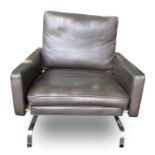 A contemporary stainless steel and leather upholstered armchair, height 77cm, width 81cm, depth