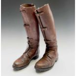 A pair of russet brown gentleman's hobnail boots, possibly military, height 45cm.