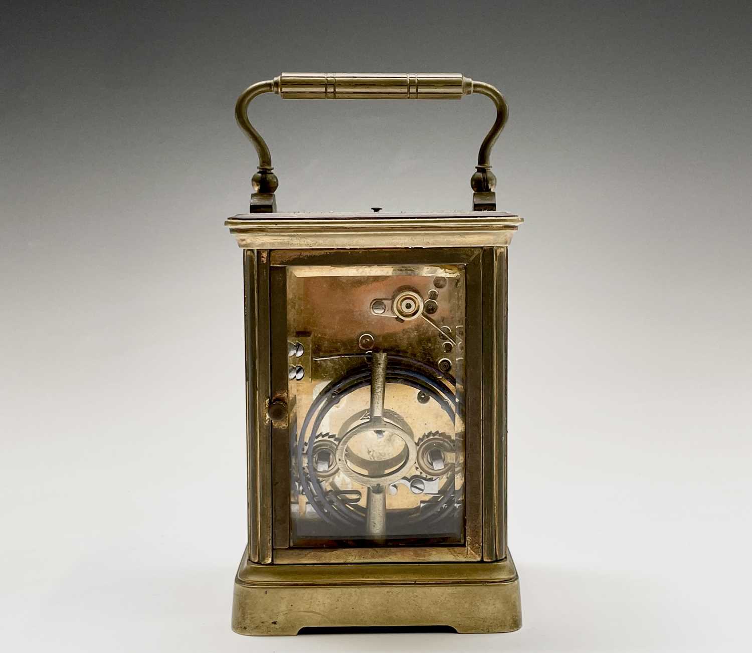 A French brass repeating carriage clock, circa 1900, with white enamel dial, striking on a coiled - Image 2 of 7