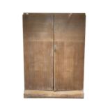 An oak veneered 1930s patent Compactum wardrobe, with typical well fitted interior, with