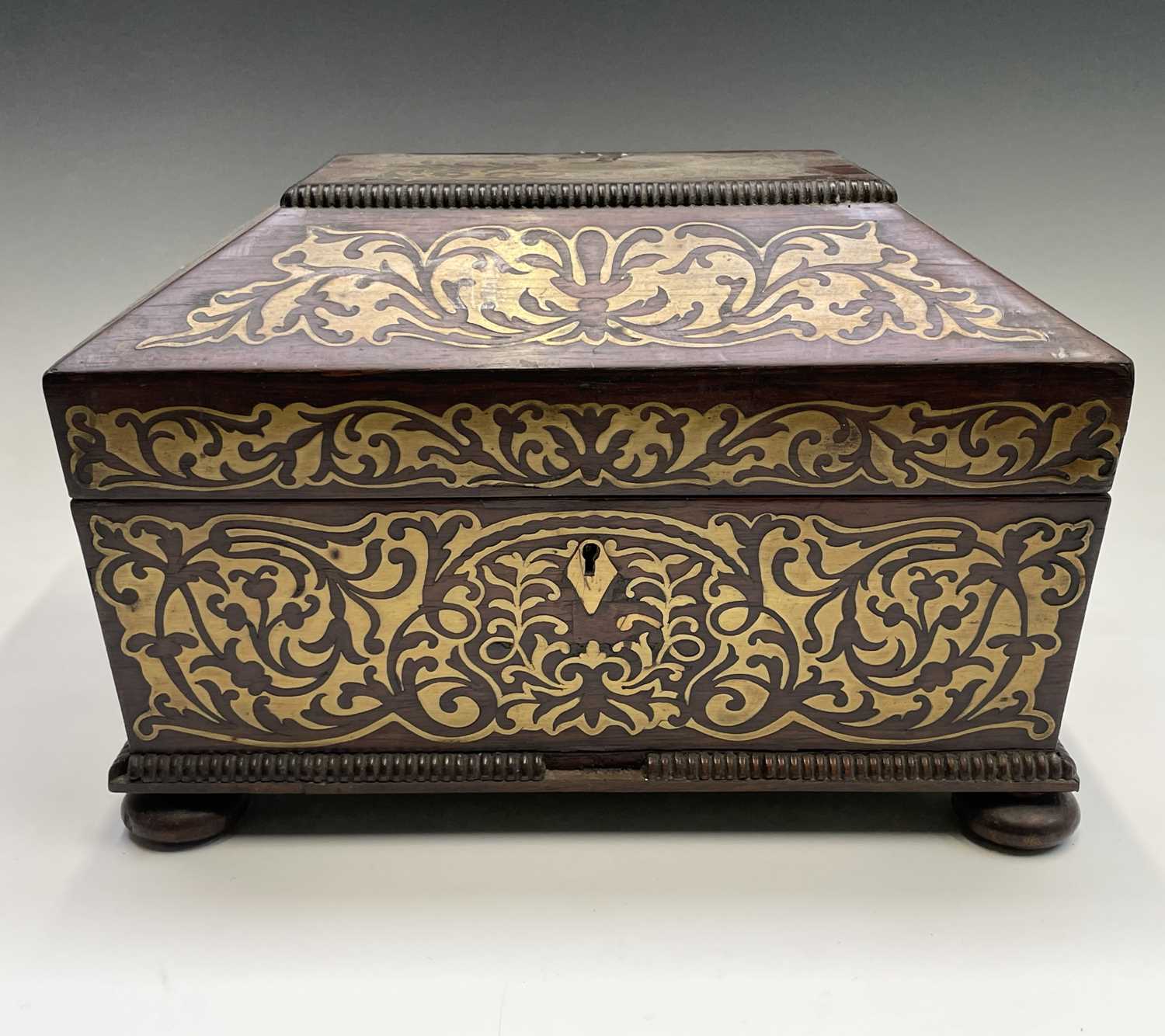 A Regency rosewood and cut brass inlaid box or casket, raised on bun feet, width 30cm. Provenance: - Image 4 of 6