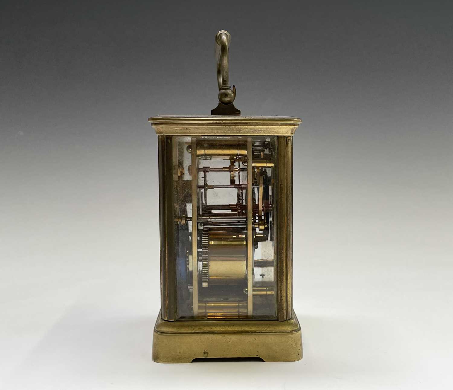 A French brass repeating carriage clock, circa 1900, with white enamel dial, striking on a coiled - Image 7 of 7
