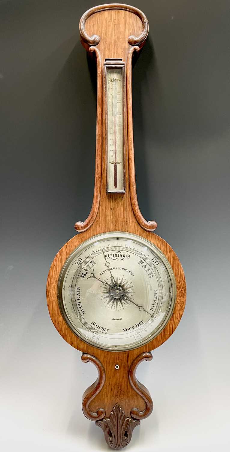 A Victorian rosewood wheel barometer, the silvered dial signed Beringer and Schwerer, Redruth,