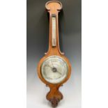 A Victorian rosewood wheel barometer, the silvered dial signed Beringer and Schwerer, Redruth,