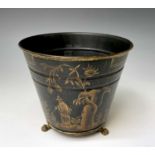 A chinoiserie tole ware planter, early 20th century, with gilt lion paw feet, height 15cm,