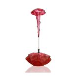 A Victorian cranberry glass single spill epergne, circular base with a frilled edge, height 53cm.