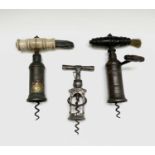 A Thomason type corkscrew with bone handle and brush, height 17cm, together with a 19tg century