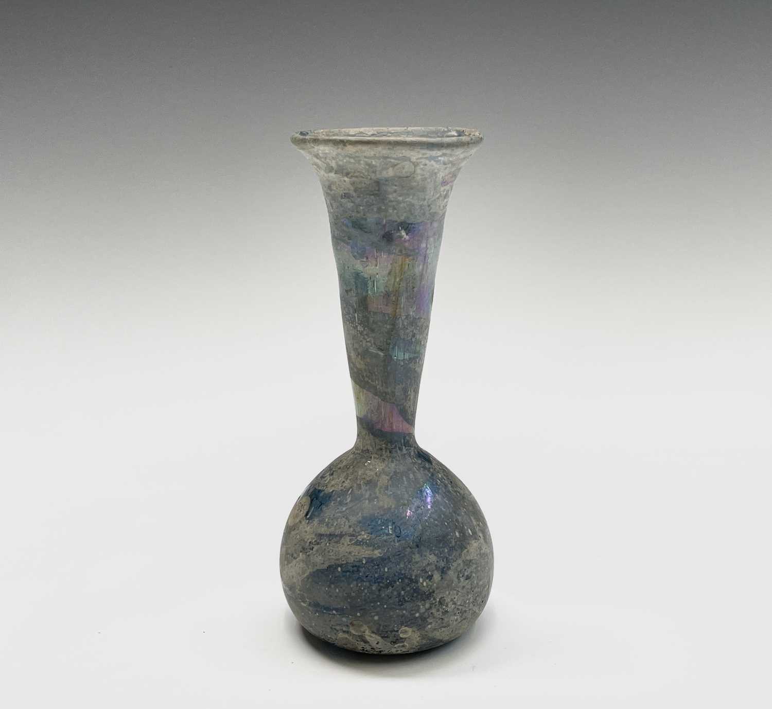 Three iridescent glass vessels, possibly Roman, comprising a ewer, height 13cm, and two vases. - Image 3 of 16