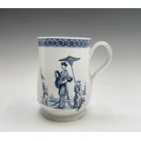 An 18th century blue and white bell form mug, probably Derby, printed to one side with an Oriental