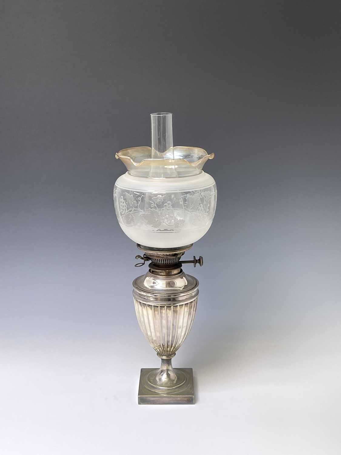 An Edwardian silver plated urn shaped table oil lamp, with Hink's patent burner and with an etched