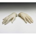 Two mannequin hands. Length 22cm.