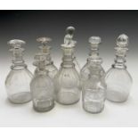 A George III triple ring neck glass decanter and stopper, height 25cm, together with seven other