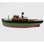 A 20th century model of a steam boat, the hull painted in green and red. Overall length 110cm.