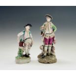 A Chelsea porcelain figure of a sportsman, circa 1760, with a dog at his feet, height 21.5cm,