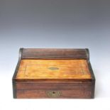 A camphor wood campaign stationary box/writing slope, 19th century, the drawer and tambour top