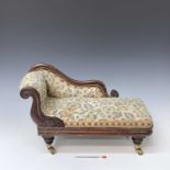 A Victorian miniature mahogany chaise lounge, possibly an apprentice piece or for a doll, with