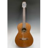 An Admira Spanish-type classical guitar with stand and soft case.