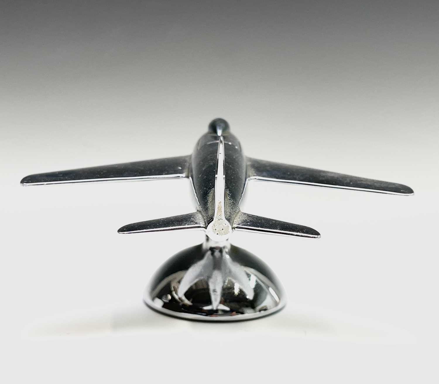 A Dunhill 'Sabre' jet fighter table lighter, 1950s, with chrome finish, on a domed base, length 16. - Image 9 of 12