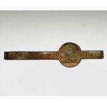 A tin strap ingot reproduced from an old mould, bearing inscription 'Lewis Chas. Daubuz Truro' and a