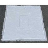 A white cotton counterpane with floral embroidery, 220 x 220cm approx. plus 10 cms crotchet