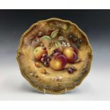 A Royal Worcester fruit painted plate, signed Paul English, late 20th century, decorated with