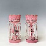 A pair of Victorian pink opaque glass lustre vases, with floral enamel and gilt painted