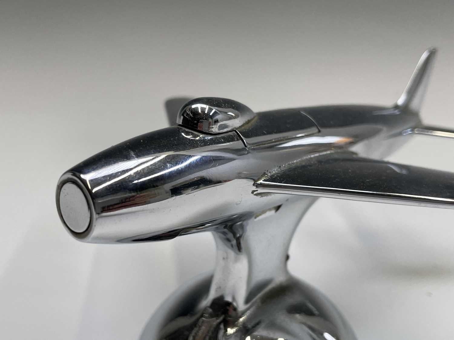 A Dunhill 'Sabre' jet fighter table lighter, 1950s, with chrome finish, on a domed base, length 16. - Image 7 of 12