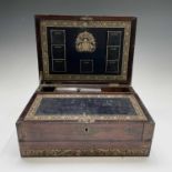 An early Victorian rosewood and brass inlaid writing slope, the interior with tooled leather and