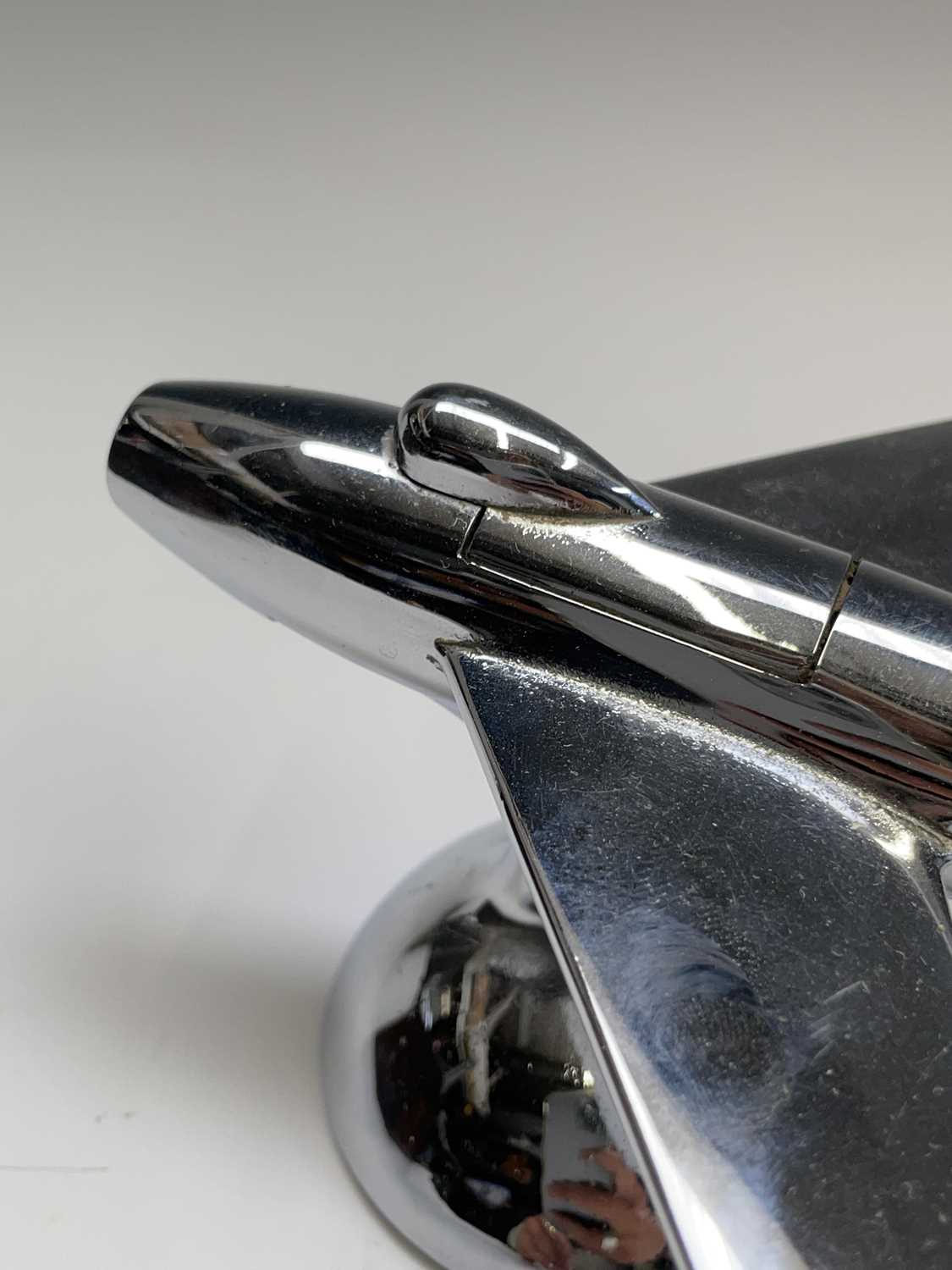 A Dunhill 'Sabre' jet fighter table lighter, 1950s, with chrome finish, on a domed base, length 16. - Image 2 of 12