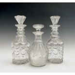 A pair of Victorian cut glass decanters and stoppers, with drape cut sides, height 28.5cm,